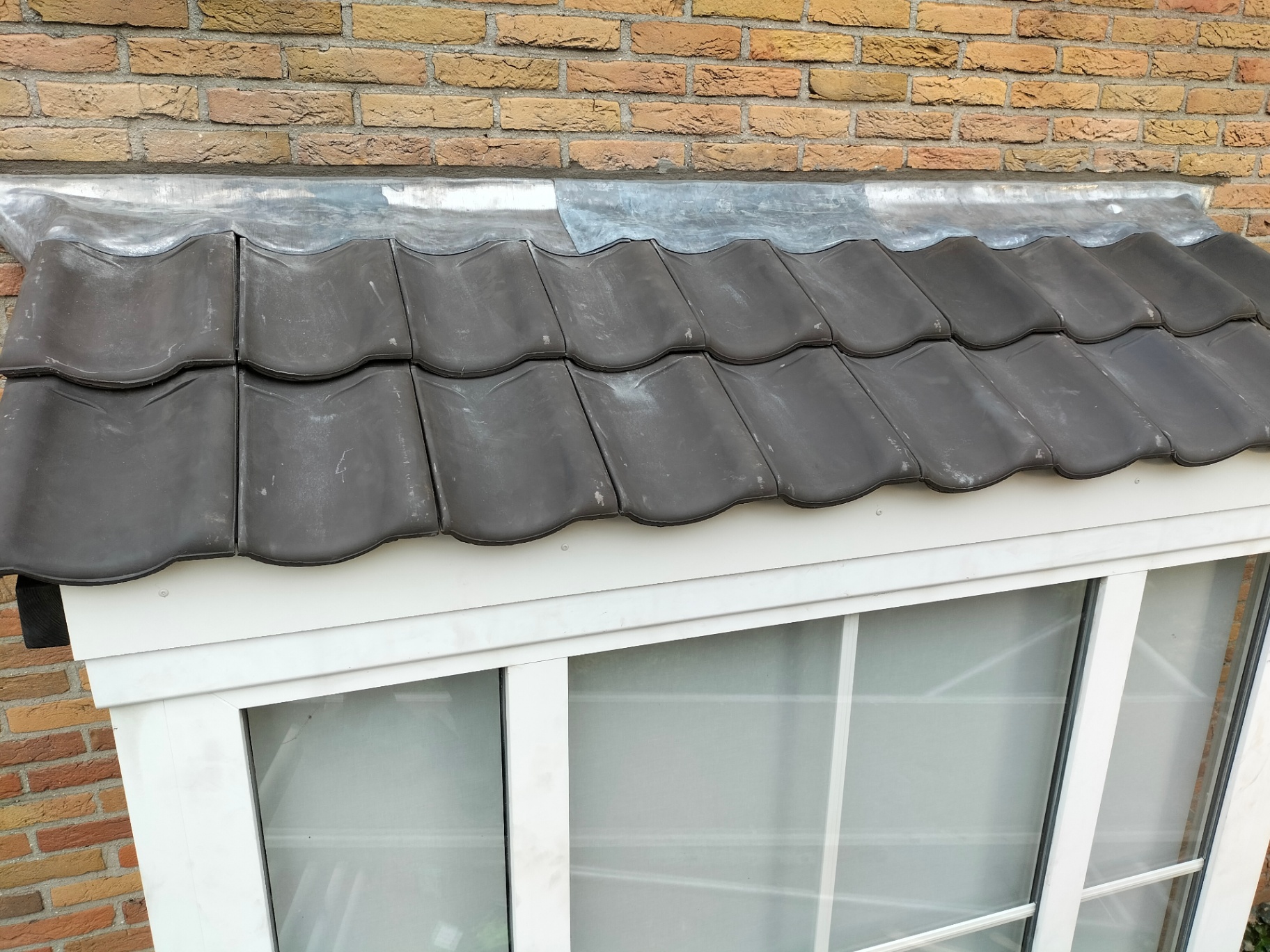 Dakkapel met keramische pannen